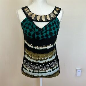 Multicolor Linda Segal tank top with round wooden discs across the neck.